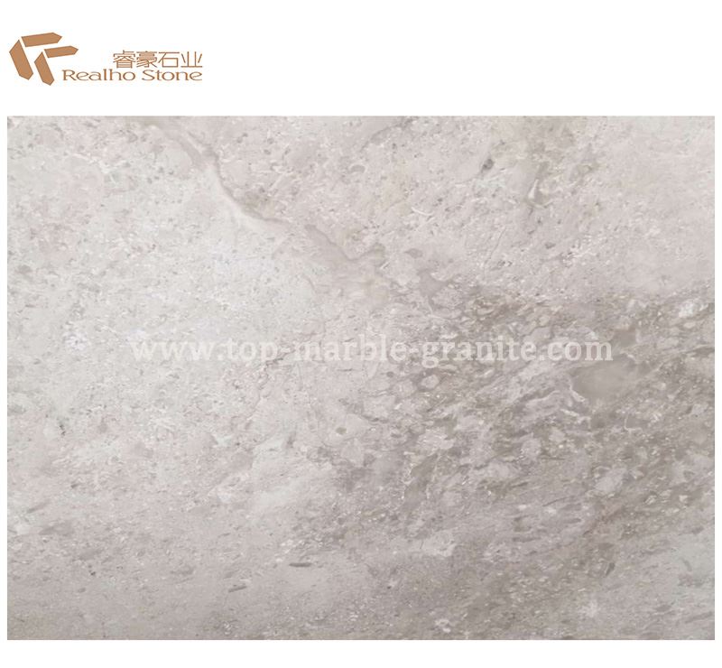 white and beige marble tile